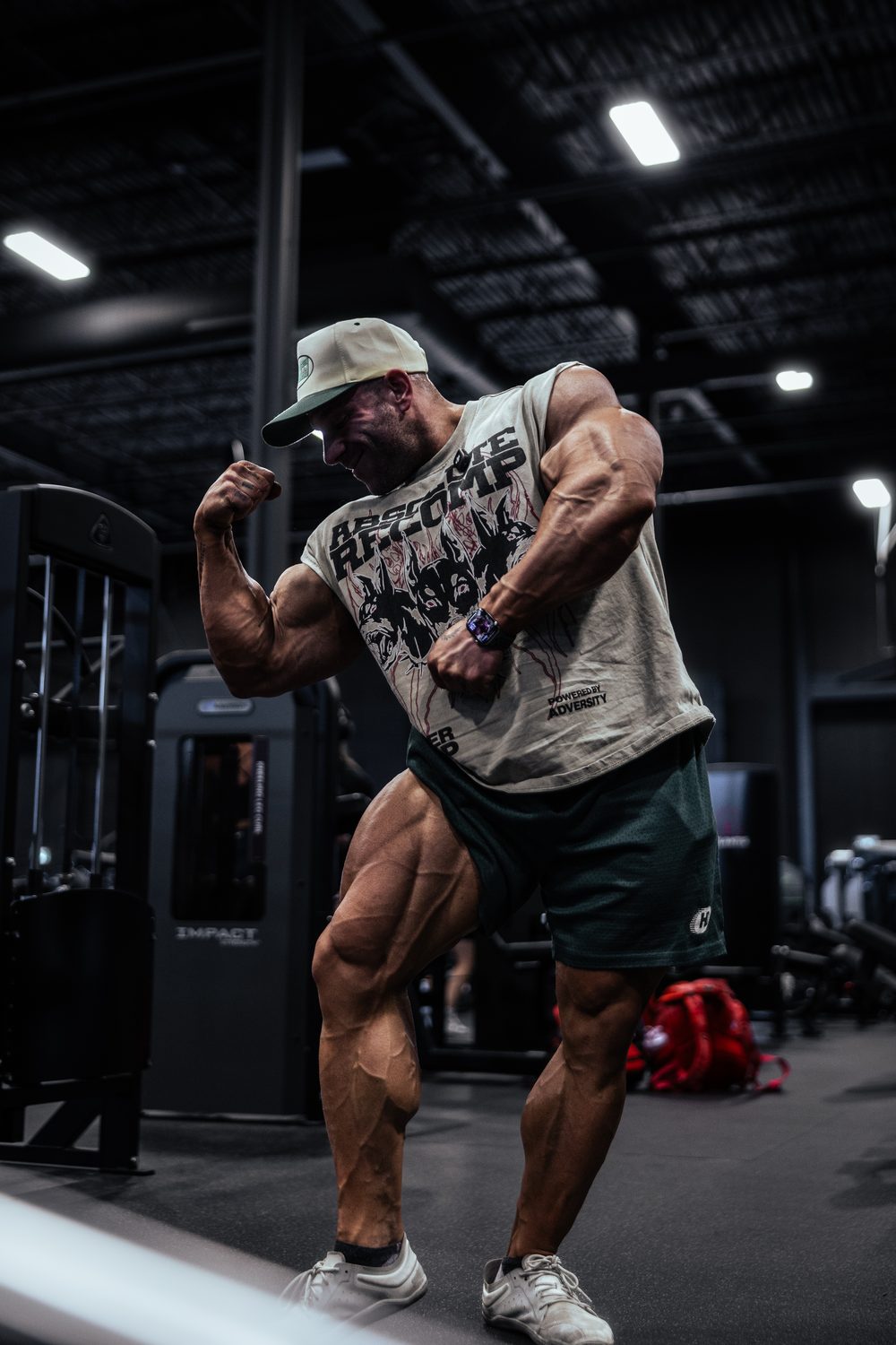 Athlete posing in gym, branded apparel