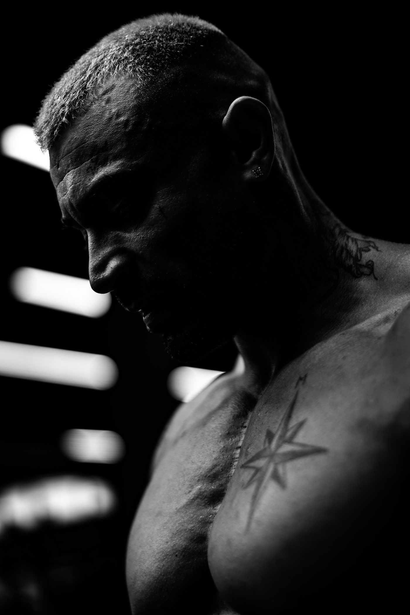 Black and white athlete portrait in hard light